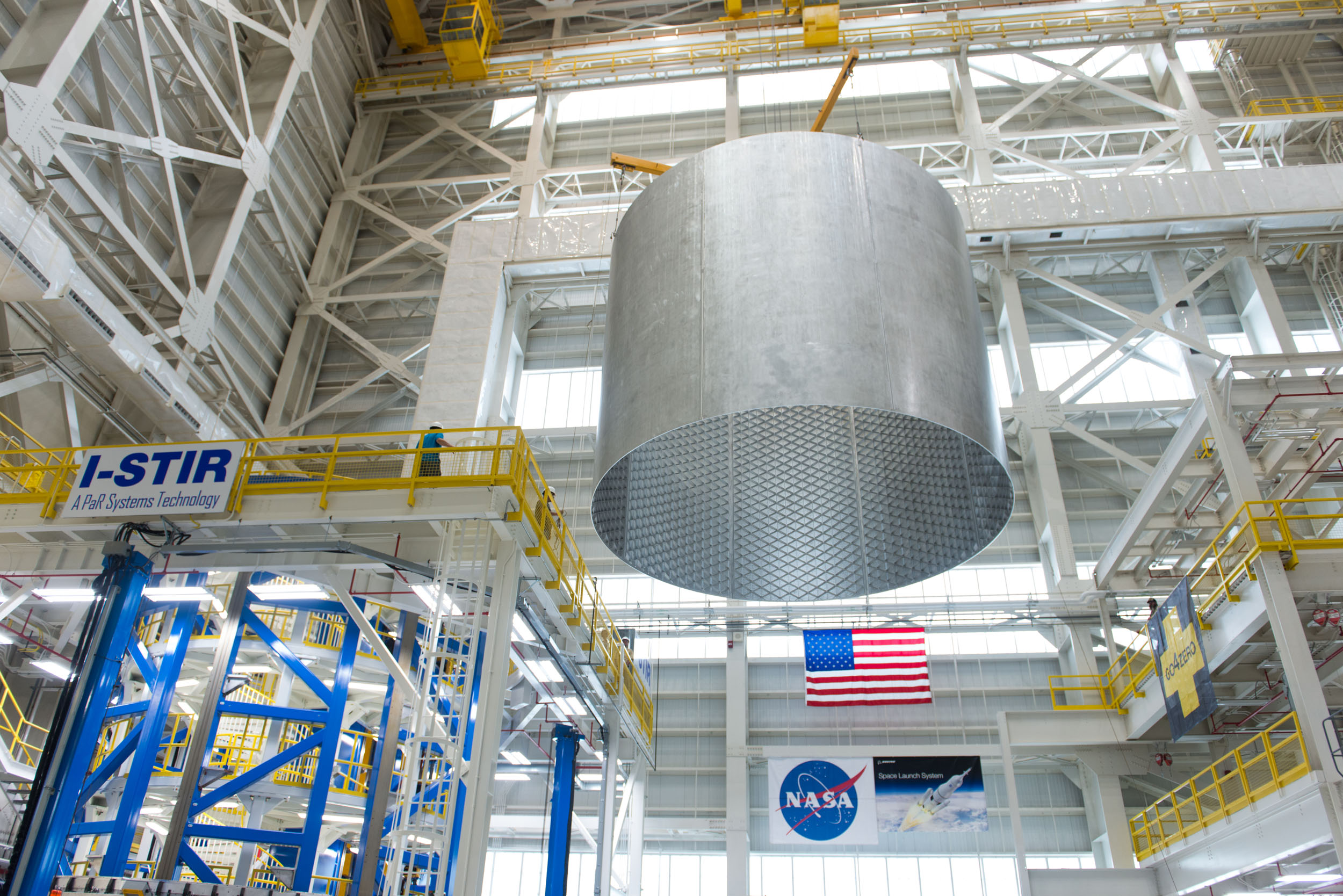 completed friction stir welded cryogenic tank section being lifted with crane