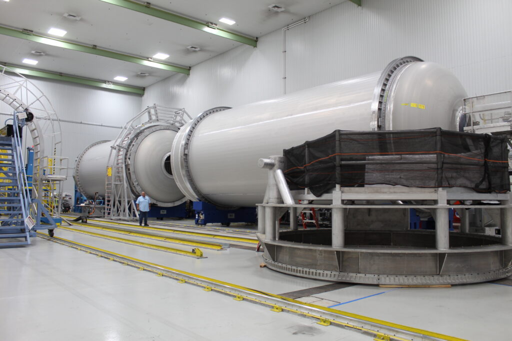 Two large cylindrical barrels side by side in a manufacturing facility that hold liquid oxygen and liquid natural gas for United Launch Alliance's Vulcan rocket