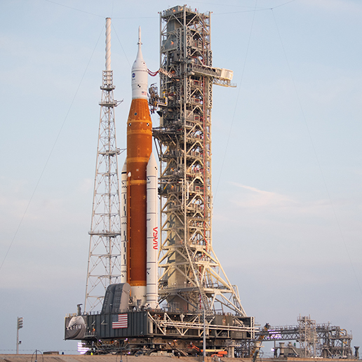 Space launch vehicle on launch pad.