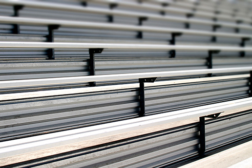 Rows of empty aluminum bleachers