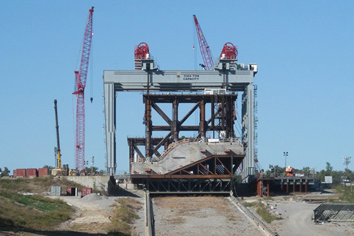 Olmstead dam crane lifting large concrete structures into place