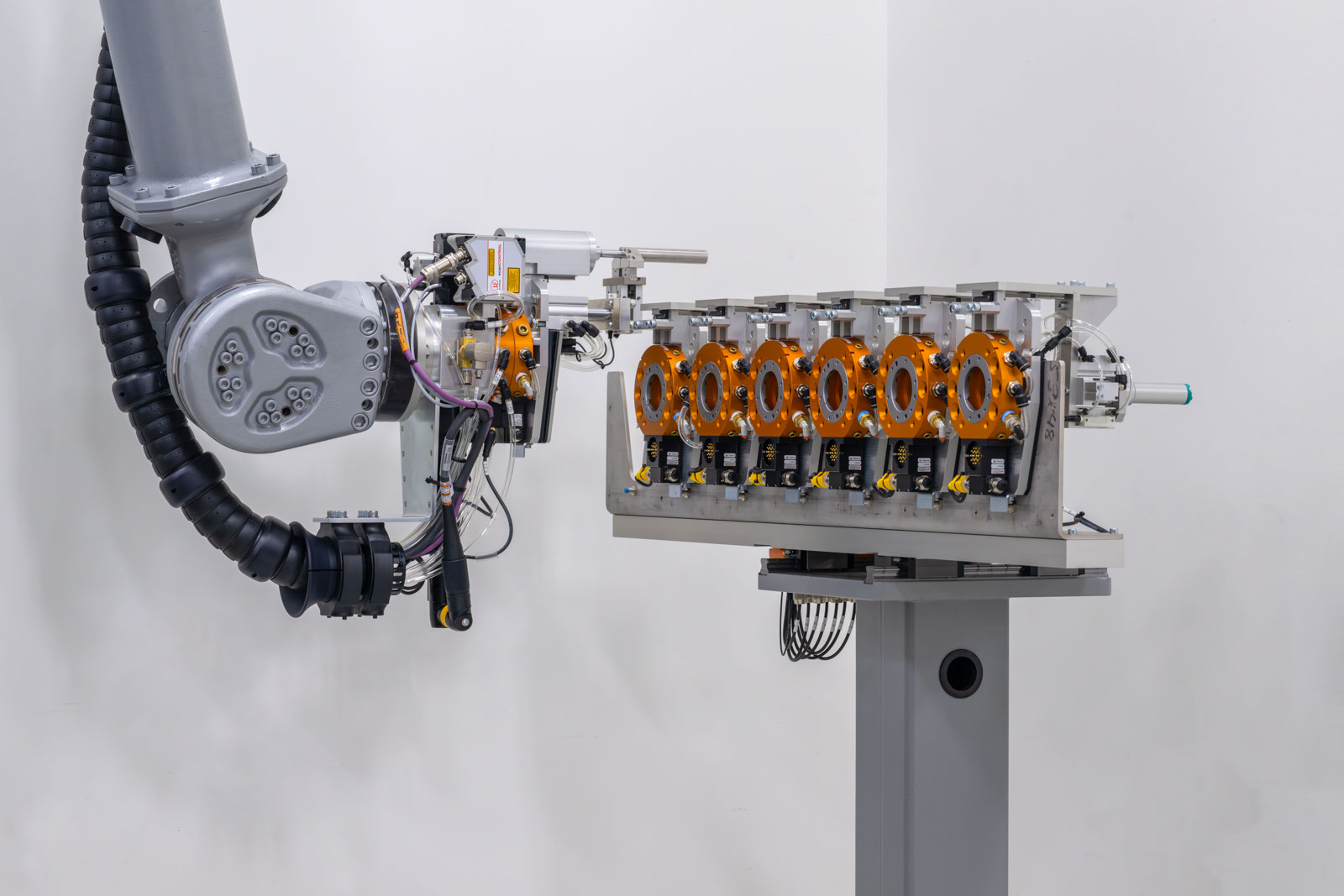 tool rack for interchangeable end effector in automated fastening work cell