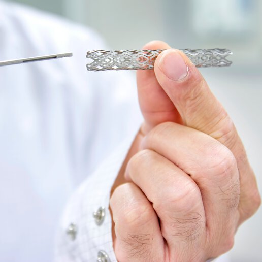 laser wire ablation systems for catheters and stents - hand holding stent